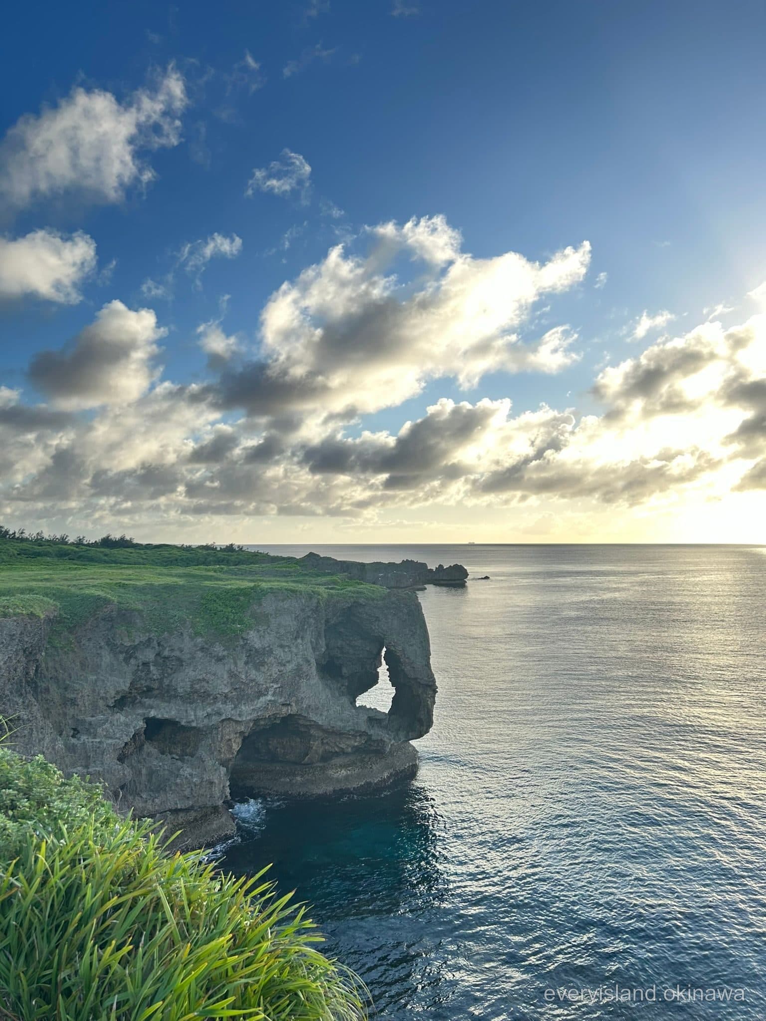 The elephant-trunk rock formation of Cape Manzamo with morning light on the sea